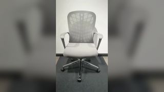 صندلی اداری خاکستری با حداکثر راحتی ارگونومیک